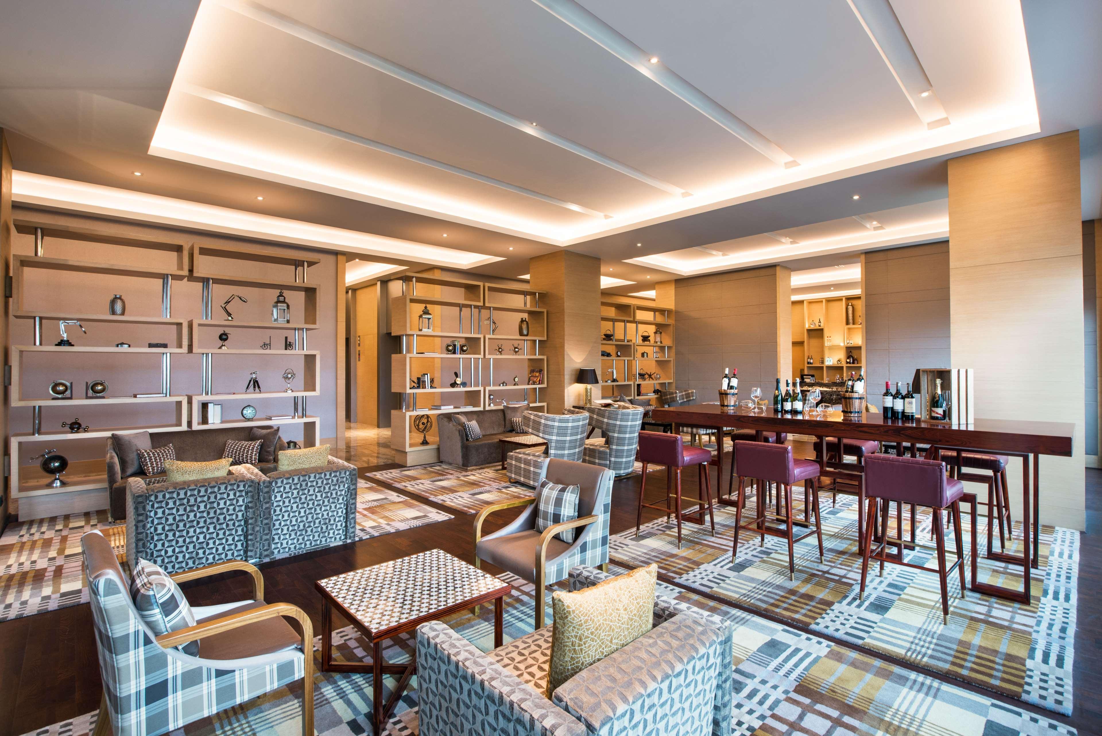 Hyatt Regency Lucknow Gomti Nagar Hotel Exterior photo The Club lounge at Kuala Lumpur International Airport
